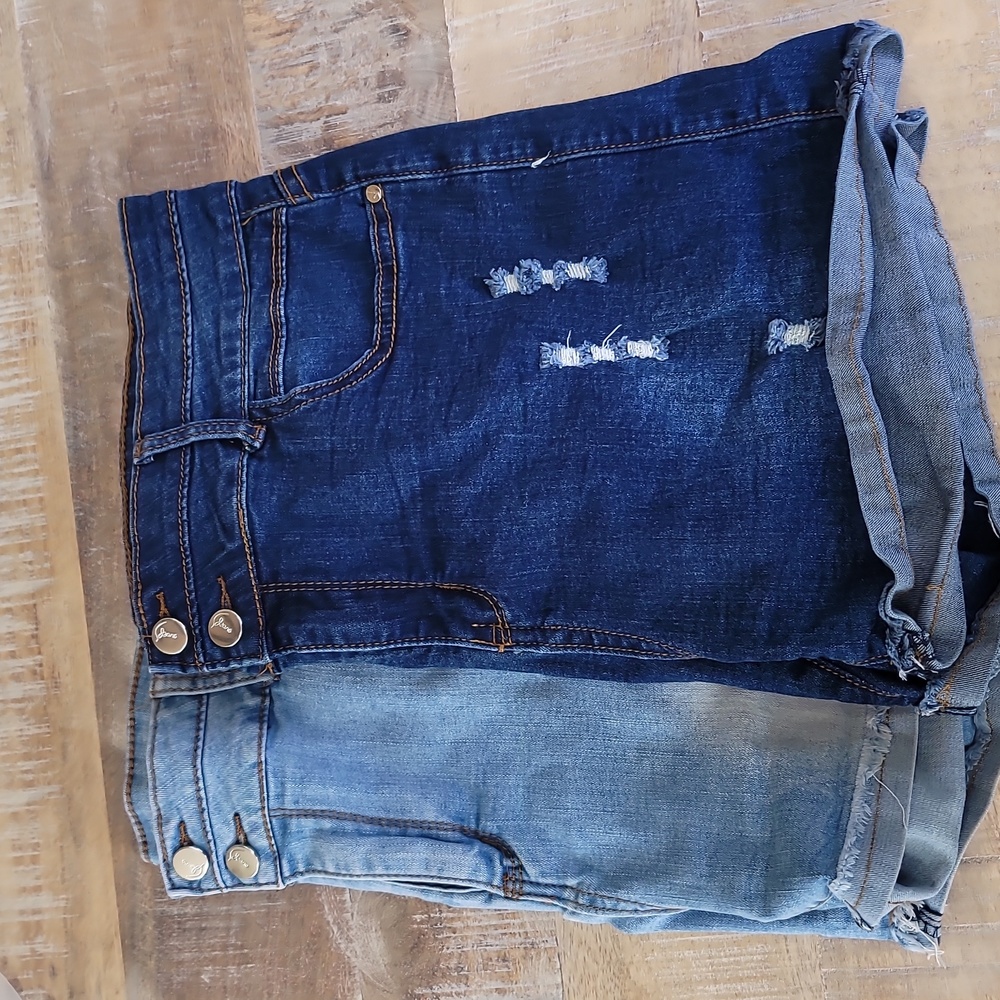NWOT 2 PAIR ultra stretch shorts size 12 fits big with stretch. LOVE THESE!